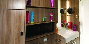 Speakers,-a-mirror-on-a-bracket-and-a-heated-towel-rail-in-the-washroom-80119