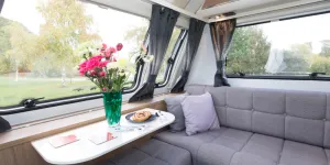 web-The-coffee-table-hinged-at-the-front-of-the-caravan-is-76cm-wide-and-35cm-deep.-98077
