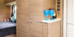 web-This-is-the-only-transverse-bed-caravan-to-have-one-wardrobe-rather-than-two.-The-cabinet-alongside-has-seven-shelves-35202