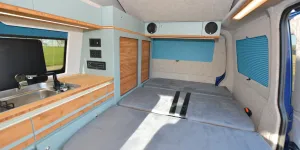 The Out and About Campers rising roof campervan bed