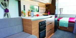 The-fridge,-on-the-aft-end-of-the-ktichen,-is-the-tall,-slimline-133-litre-capacity-model-from-Thetford-65187