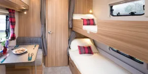 web-4-The-cosy-bunk-“bedroom”-is-integrated-with-the-dining-area-87888