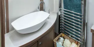 A-large-Alde-heated-towel-rail-alongside-the-washbasin-67090