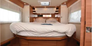 Carthago Chic C-line I 6.2 XL QB A-class motorhome bedroom