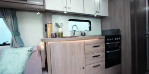 Kitchen-storage-comes-in-the-form-of-two-double-doored-top-cabinets-and-four-deep-drawers2-24872
