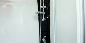 Light-surrounds-the-top-of-the-shower-unit-26419