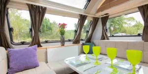 The-white-panel-behind-the-centre-front-seat-is-a-hinge-up-coffee-table-10995