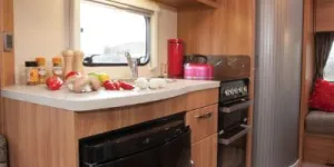 rhp_The microwave - part of the extras package - sits wirthin the top cabinet run