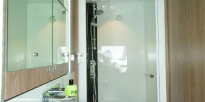 The-shower-cubicle,-a-good-sized-65cm-x-80cm,-contains-two-shelves-for-shampoo-containers-w500-85273