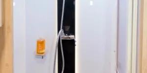 A-large-square-shower-rose-and-a-smart-black-panel-30227