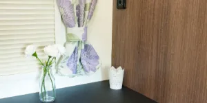 A-triangular-bedroom-table-for-your-television;-connection-points-are-above.-w500-39890