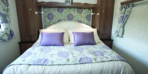 A-brilliantly-cosy-bedroom---with-a-semi-circular-mattress-section-augmenting-the-bedhead-w800-39855