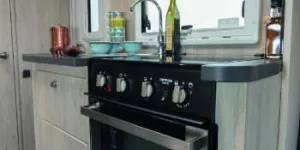 The-kitchen-has-two-cabinets,-50cm-and-46cm-wide,-and-a-large-drawer-that-contains-a-five-recess-cutlery-tray-w350-37510