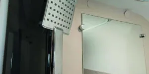 A-big,-square,-stylish-shower-head-mounted-on-a-smart-black-base--w350-36490