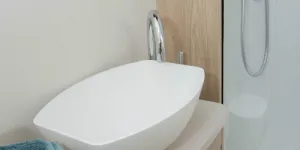 The-bowl-sits-up-on-its-cabinet-in-ultra-modern-style-w500-16703