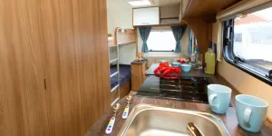 A-lengthy-kitchen-and-a-spacious-family-area-beyond-44609