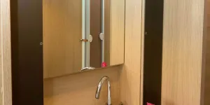 Slim-cabinets-flank-the-mirror;-the-bowl-has-a-pop-up-plug-95560