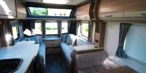 A-side-dining--area,-a-long-kitchen-(plus-an-extension)-and-a-lounge-long-enough-to-be-used-as-single-beds-25673