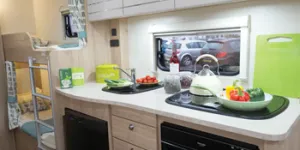 Three-drawers-and-a-cabinet,-all-37cm-wide,-between-the-fridge-and-the-oven-grill,-plus-space-beneath-it-25564
