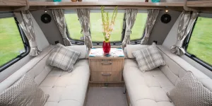 web-5-Seat-back-and-curtain-stays-are-edged-with-fine-brown-fabric-that-has-silvery-bits-in-the-weave-79851