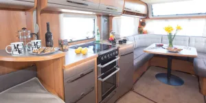 web-2-The-cool-grey-theme-of-the-fabrics-extends-to-locker-edges-and-kitchen-cabinet-doors-02571