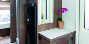 By-the-door-is-a-cabinet-ideal-for-shoes-and,-alongside,-the-155-litre-fridge-freezer-42422