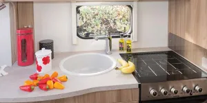 The-large-circular-sink-is-made-of-a-durable-white-marble-look-substance,-91278