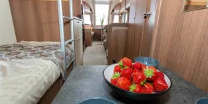 A-dining-tavle-for-children,-alongside-the-bunks-05958