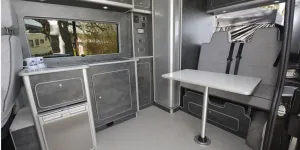 The Custom Built Campervans high-top rising roof campervan interior