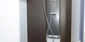 A-bar-style-towel-rail-and-a-panel-radiator-in-the-shower-79687