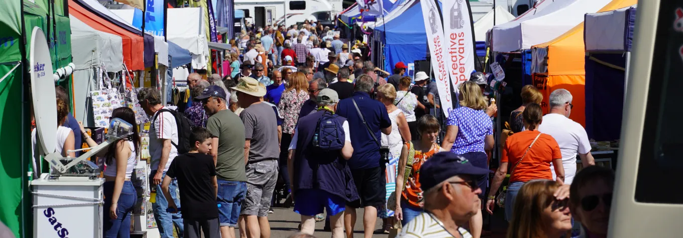 Showgoers in the trade area at the motorhome & campervan show