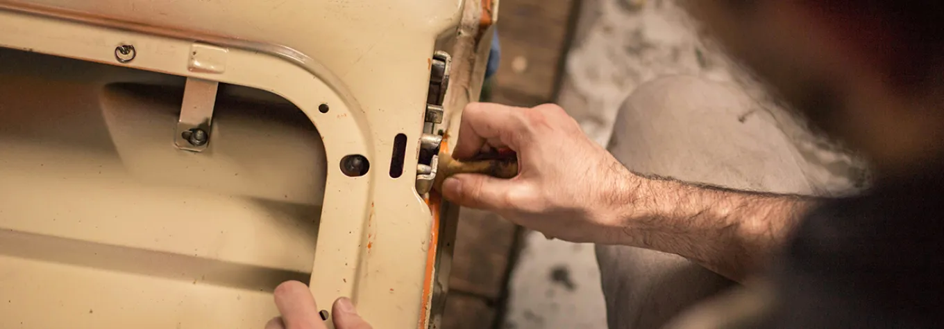 Man fixing a door lock