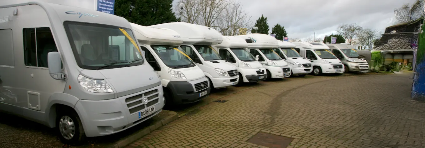 Motorhomes on a forecourt