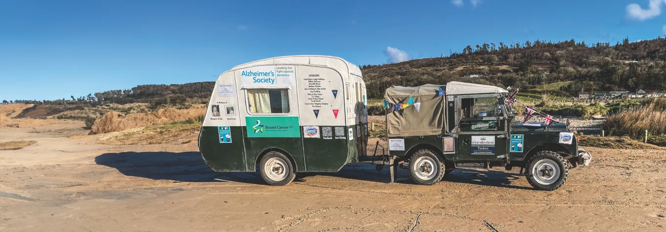 Landrover towing a vintage caravan