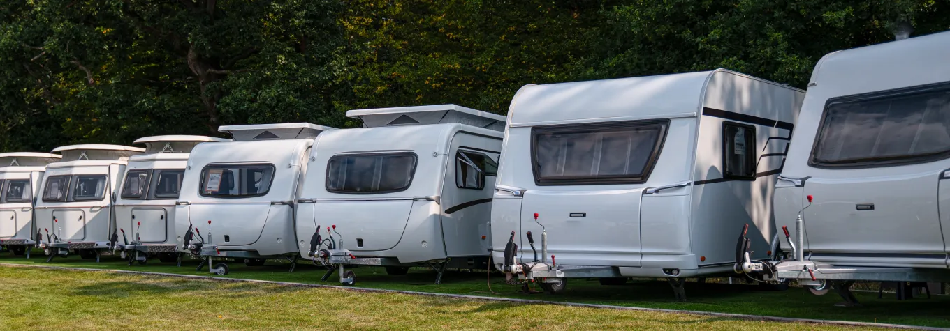 Line of Brand New Camping Vans Motorhomes. Recreational Vehicles Selling. Caravaning Industry.