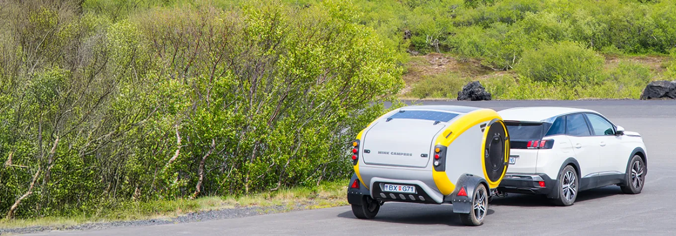 A Mink Camper being towed