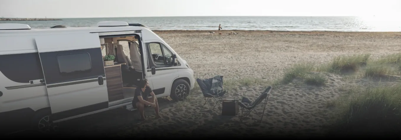 image of a campervan on a beach