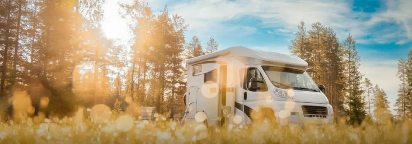 image of a motorhome in a field