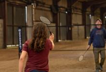 Badminton in the beach barn at Campervan Campout