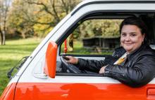 Susan Calman filming inside a motorhome on a coastal road trip
