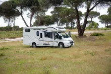 image of a motorhome in a field