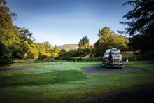 image of a campervan set up on a campsite