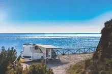image of a motorhome by the sea