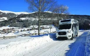 Bailey Alora 69-4S motorhome on snowy road