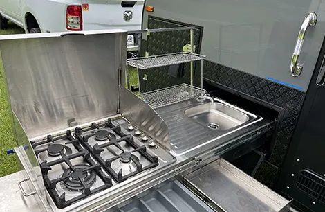 The exterior pop-out kitchen of the Warthog from Kruger Bush Campers 