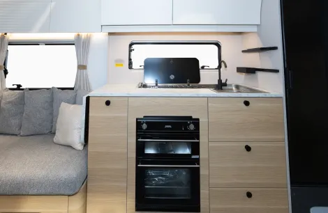 New push-button drawer catches and an oven with a separate grill