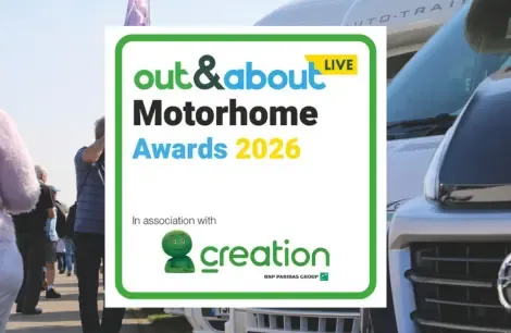 image of motorhomes parked up with the out and about live motorhome awards logo in the middle