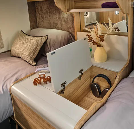 Bailey Adamo XL-T has fixed single beds at the rear with storage between