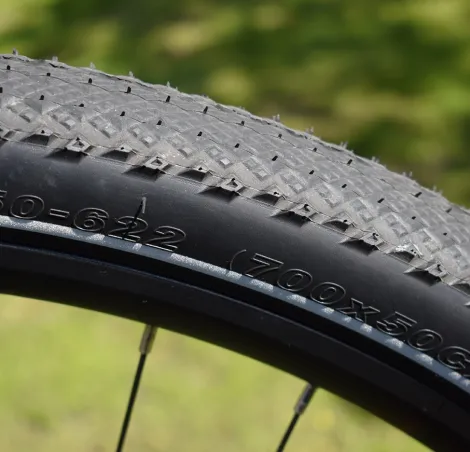 Large volume tyres with tread ideal for off-road on the Tenways AGO Air