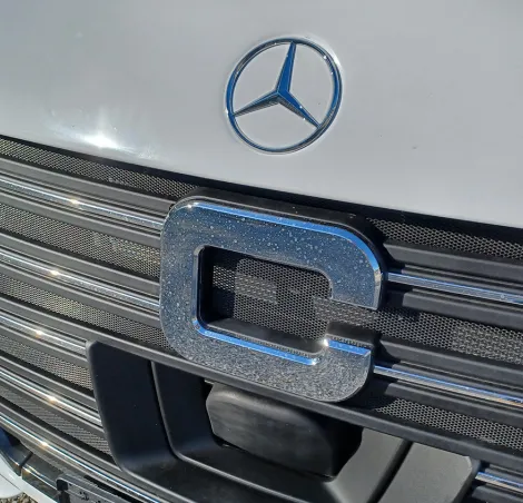 Carthago C2-tourer front grille showing large C-shaped decal and Mercedes badge